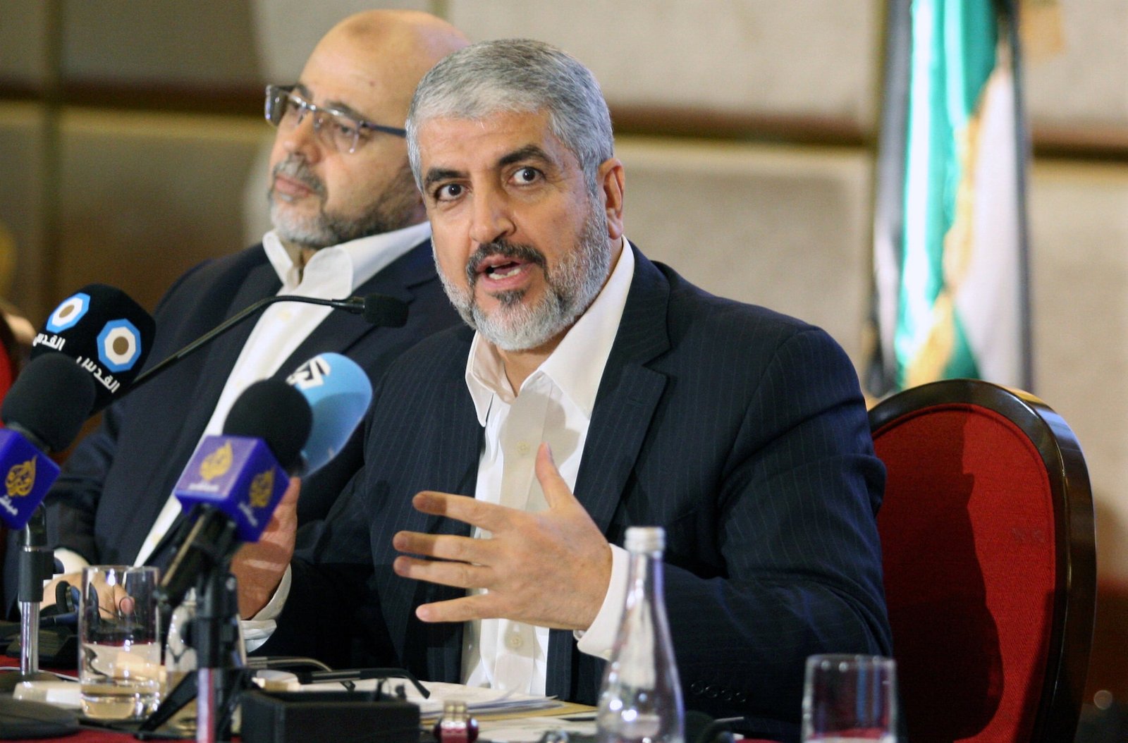 hk2vtppmhzmozimx6ngqnfybeu Hamas leader Khaled Meshaal gestures as he announces a new policy document in Doha
